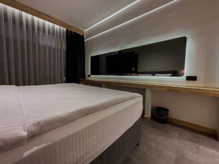 Scape Hotel Fethiye inside room bed and television 6
