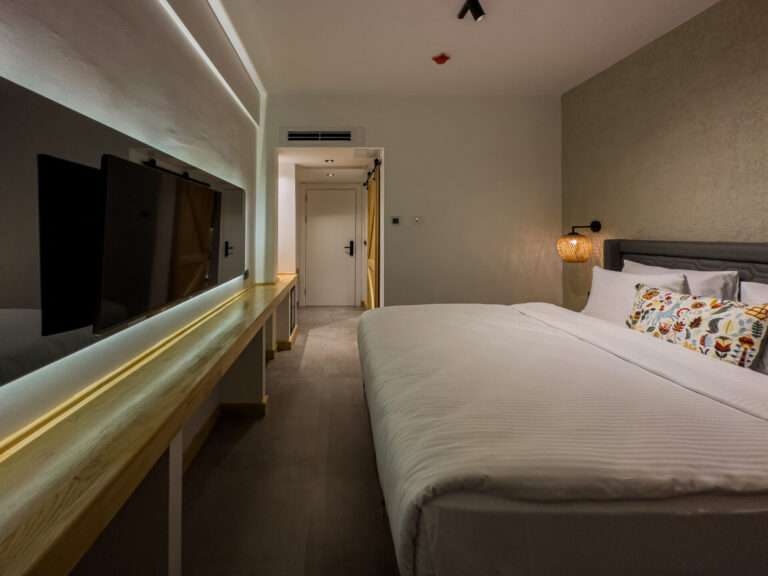 Scape Hotel Fethiye inside room bed and television 9