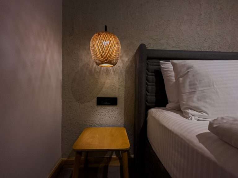 Scape Hotel Fethiye inside view of the bed and side table and the side light 1-min