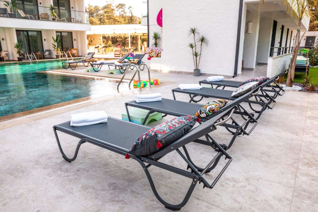 Scape Hotel Fethiye pool with sun bading loungers 1