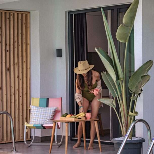 Scape Hotel Fethiye Outside balcony pool access with woman arranging fruits