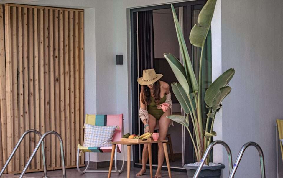 Scape Hotel Fethiye Outside balcony pool access with woman arranging fruits